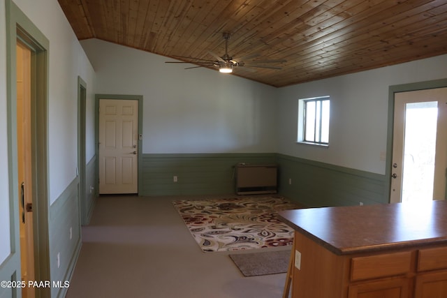 1155 W Half Moon Ct, Ash Fork, AZ 86320 - kitchen with wood ceiling, a ceiling fan, a wainscoted wall, and lofted ceiling