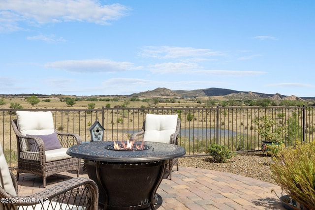 5313 Autumn Leaf Ln, Prescott, AZ 86301 - view of patio / terrace with a mountain view and an outdoor fire pit