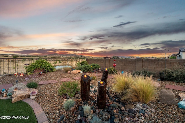 5313 Autumn Leaf Ln, Prescott, AZ 86301 - yard at dusk with a fenced backyard