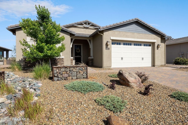 5313 Autumn Leaf Ln, Prescott, AZ 86301 - ranch-style house with stucco siding, a garage, decorative driveway, and a tiled roof