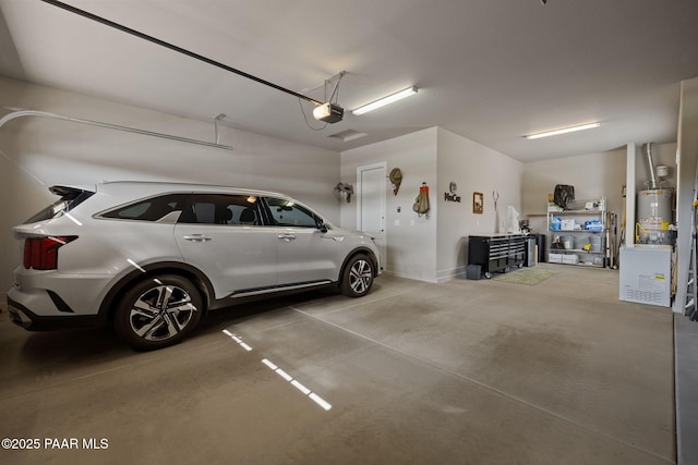 5313 Autumn Leaf Ln, Prescott, AZ 86301 - garage featuring water heater and a garage door opener