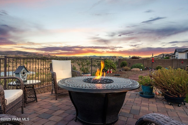 5313 Autumn Leaf Ln, Prescott, AZ 86301 - fenced backyard featuring an outdoor fire pit and a patio area
