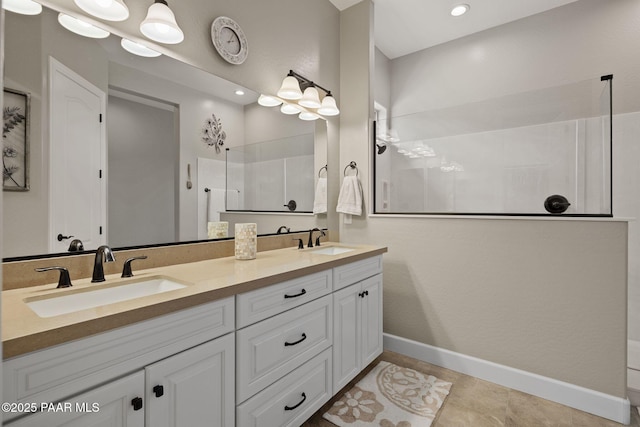 5313 Autumn Leaf Ln, Prescott, AZ 86301 - bathroom with double vanity, a tile shower, and baseboards