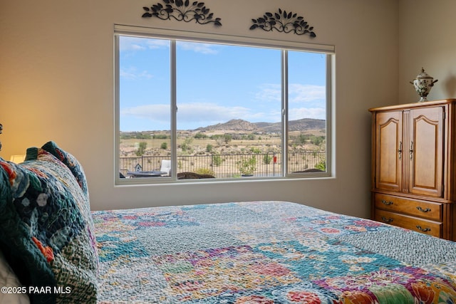 5313 Autumn Leaf Ln, Prescott, AZ 86301 - bedroom featuring multiple windows and a mountain view