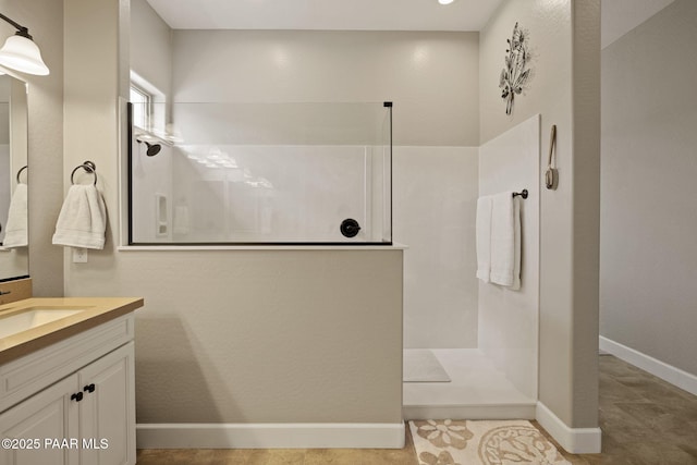 5313 Autumn Leaf Ln, Prescott, AZ 86301 - bathroom with vanity, walk in shower, baseboards, and tile patterned floors
