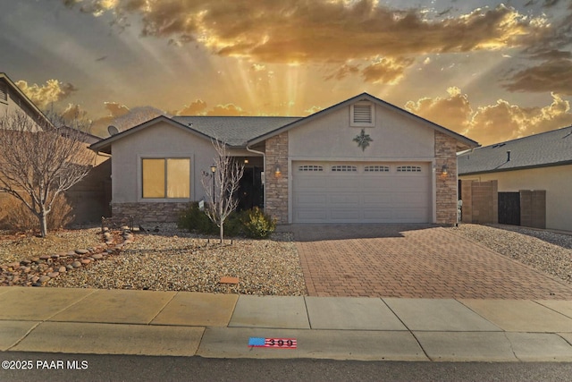 view of front of home with a garage