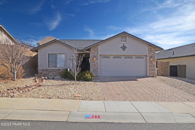 ranch-style house featuring a garage