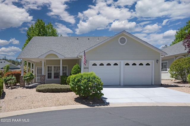 2091 E Oxford, Prescott Valley, AZ 86314 - ranch-style home featuring a garage, driveway, roof with shingles, and covered porch