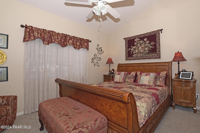 bedroom featuring light carpet, ceiling fan, and lofted ceiling