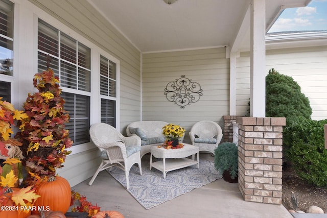 view of patio featuring a porch