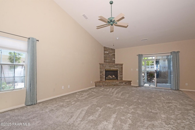 2091 E Oxford, Prescott Valley, AZ 86314 - unfurnished living room featuring carpet, high vaulted ceiling, a ceiling fan, a stone fireplace, and baseboards