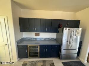 kitchen featuring stainless steel refrigerator