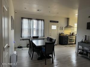 dining room featuring light wood-type flooring