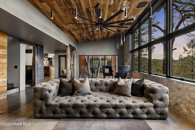 51 Rill Rd, Prescott, AZ 86305 - living area with wooden ceiling, finished concrete flooring, high vaulted ceiling, and a ceiling fan