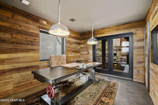 51 Rill Rd, Prescott, AZ 86305 - dining area with wooden walls and finished concrete floors