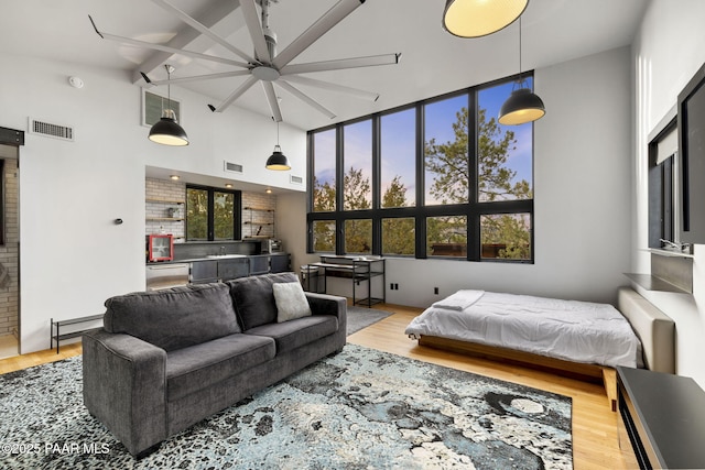 51 Rill Rd, Prescott, AZ 86305 - bedroom featuring a high ceiling, wood finished floors, and beamed ceiling