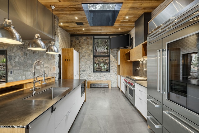 51 Rill Rd, Prescott, AZ 86305 - kitchen featuring a sink, wooden ceiling, modern cabinets, premium appliances, and white cabinetry