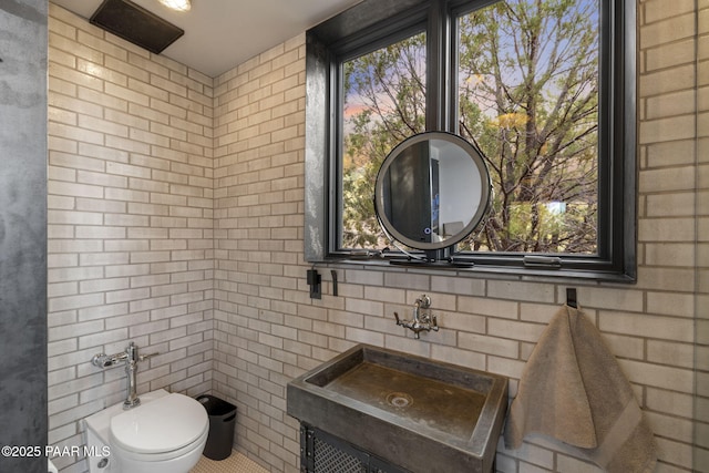 51 Rill Rd, Prescott, AZ 86305 - half bathroom with a sink, toilet, and tile walls