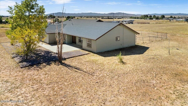 exterior space featuring a mountain view