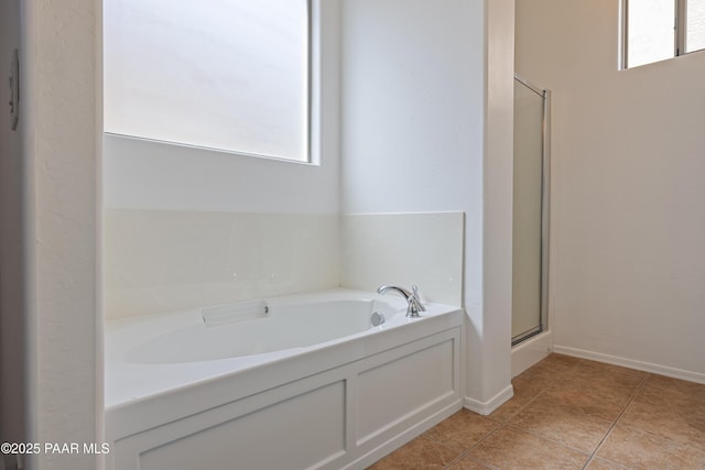 1735 Oro Dr, Cottonwood, AZ 86326 - bathroom with healthy amount of natural light, a bath, and a shower stall