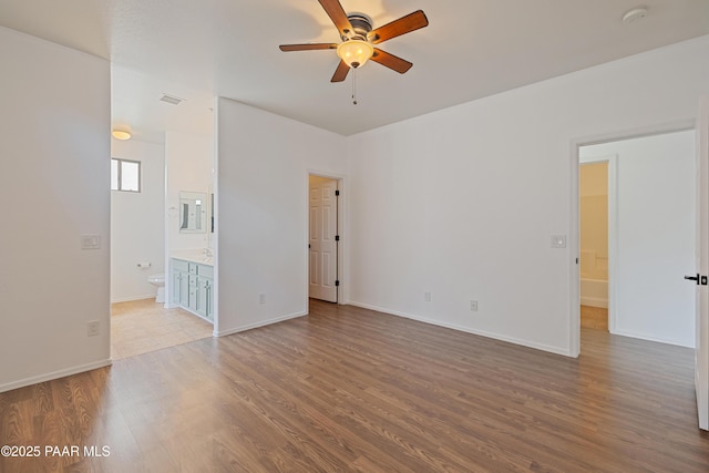 1735 Oro Dr, Cottonwood, AZ 86326 - spare room featuring a ceiling fan, wood finished floors, baseboards, and a smoke detector