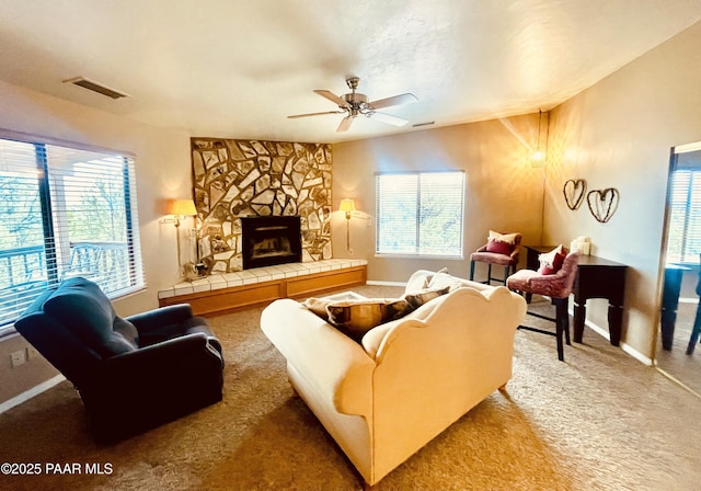 28555 N Feather Mountain Rd, Paulden, AZ 86334 - living room featuring carpet flooring, healthy amount of natural light, a ceiling fan, and baseboards