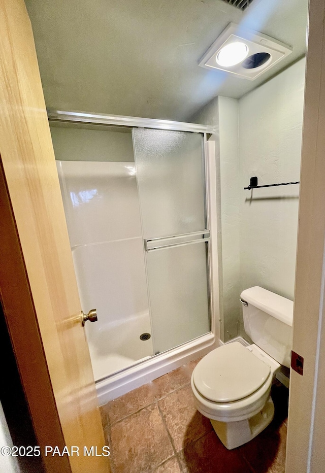 28555 N Feather Mountain Rd, Paulden, AZ 86334 - bathroom featuring a shower stall and toilet