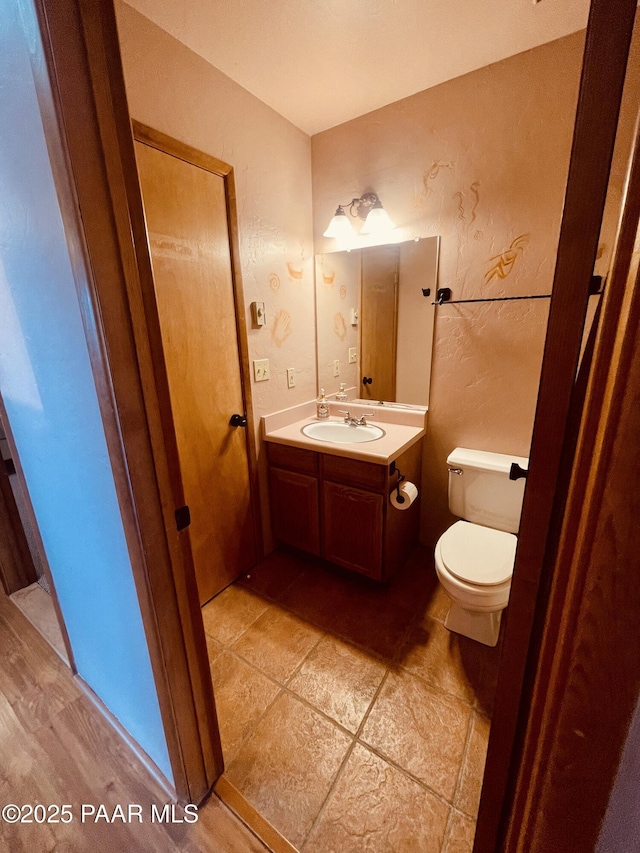 28555 N Feather Mountain Rd, Paulden, AZ 86334 - bathroom with toilet and vanity