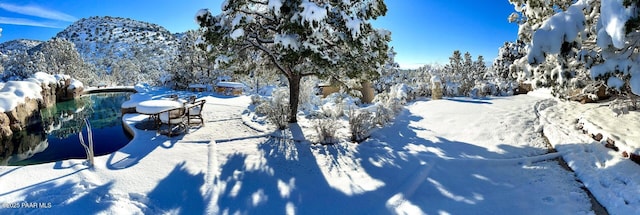 28555 N Feather Mountain Rd, Paulden, AZ 86334 - yard covered in snow with a mountain view