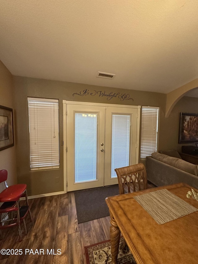 6217 N Little Papoose Dr, Prescott Valley, AZ 86314 - dining room featuring dark wood-type flooring and baseboards