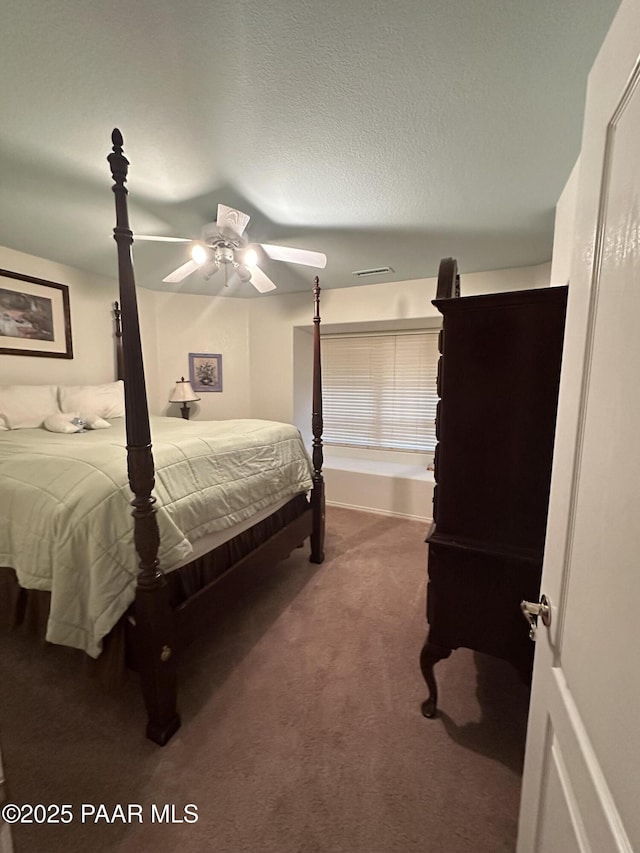 6217 N Little Papoose Dr, Prescott Valley, AZ 86314 - carpeted bedroom featuring a ceiling fan