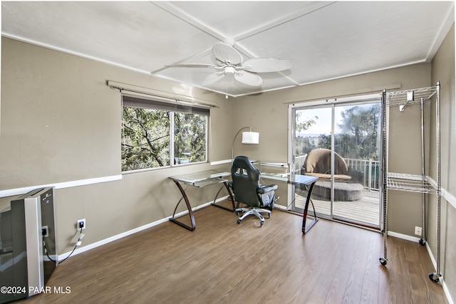 home office with hardwood / wood-style floors, a wealth of natural light, and ceiling fan
