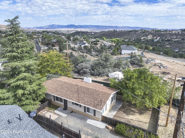 birds eye view of property featuring a mountain view