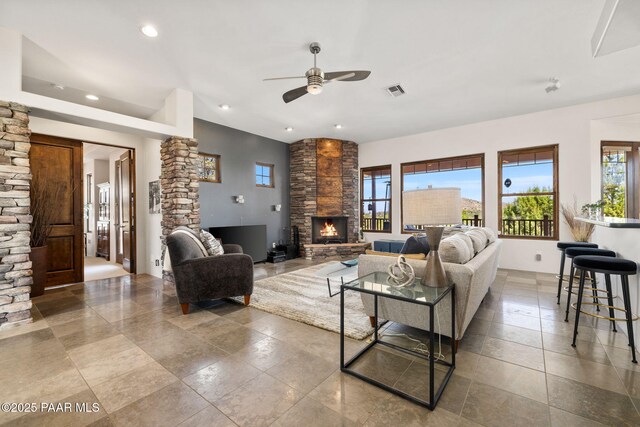 13175 N Bull Run Rd, Prescott, AZ 86305 - living room featuring decorative columns, a ceiling fan, recessed lighting, and a fireplace