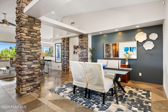 13175 N Bull Run Rd, Prescott, AZ 86305 - dining space with ornate columns, recessed lighting, high vaulted ceiling, and a ceiling fan