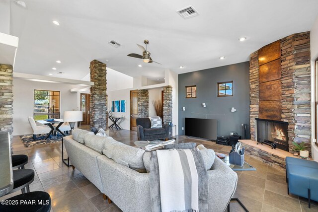13175 N Bull Run Rd, Prescott, AZ 86305 - tiled living area featuring decorative columns, a fireplace, ceiling fan, and recessed lighting
