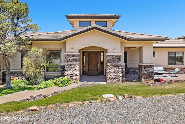 13175 N Bull Run Rd, Prescott, AZ 86305 - view of front facade with a tile roof and stone siding