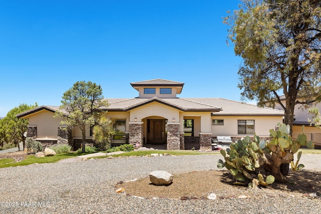 13175 N Bull Run Rd, Prescott, AZ 86305 - prairie-style house featuring stone siding and a tile roof