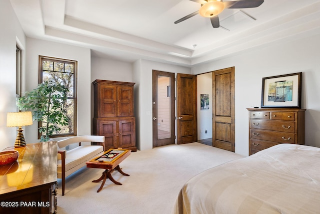 13175 N Bull Run Rd, Prescott, AZ 86305 - carpeted bedroom featuring a tray ceiling and a ceiling fan