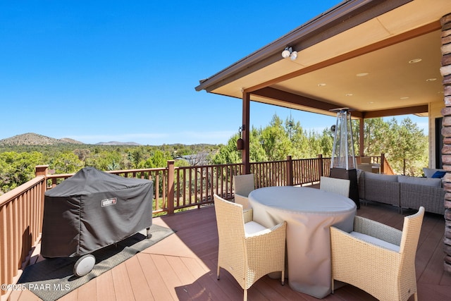 13175 N Bull Run Rd, Prescott, AZ 86305 - wooden deck with a mountain view, outdoor dining area, and outdoor lounge area