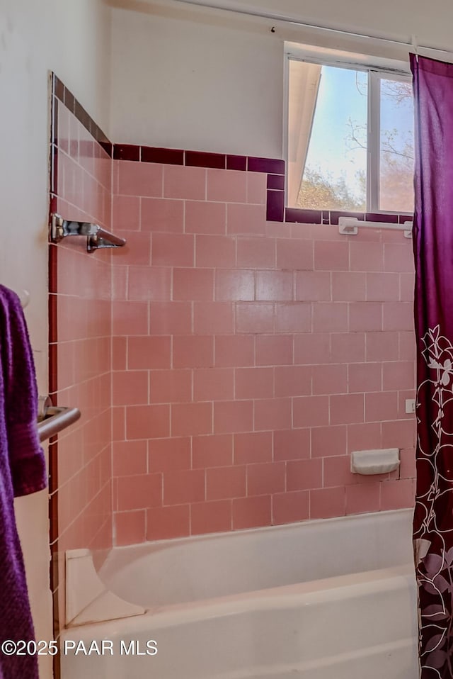 full bathroom with shower / bath combo