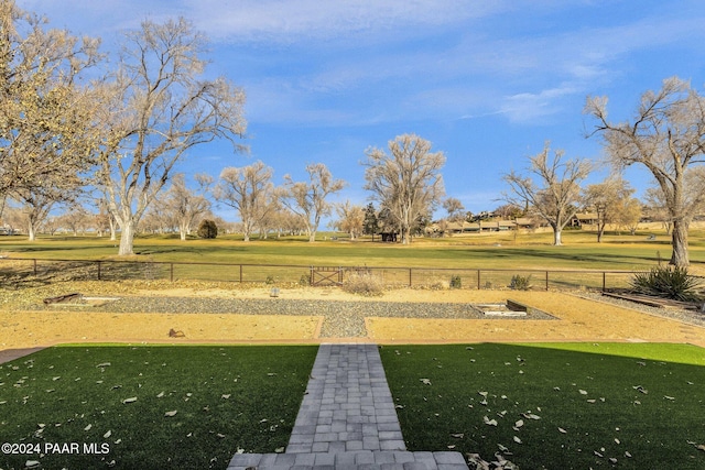 surrounding community featuring a lawn