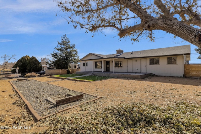 back of property featuring a patio area