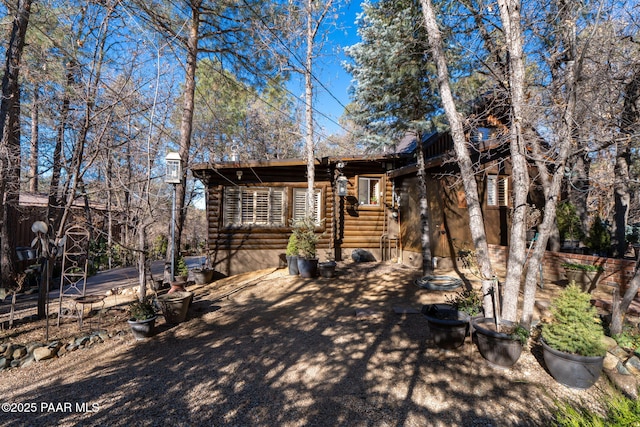 view of log-style house