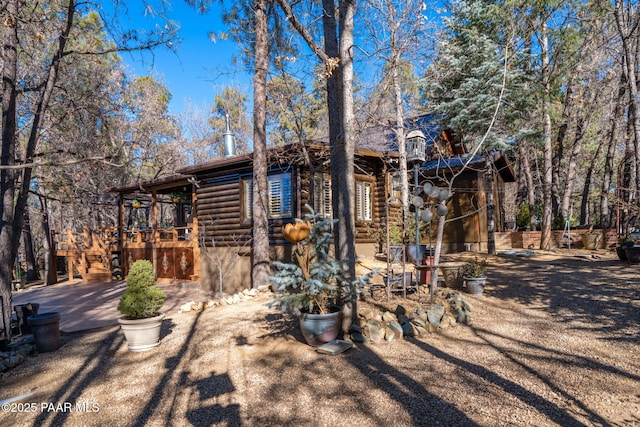 view of log-style house