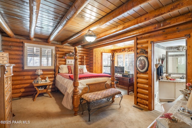 bedroom featuring light carpet, wood ceiling, ensuite bath, log walls, and sink