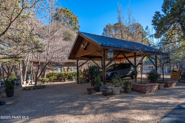 exterior space with a carport