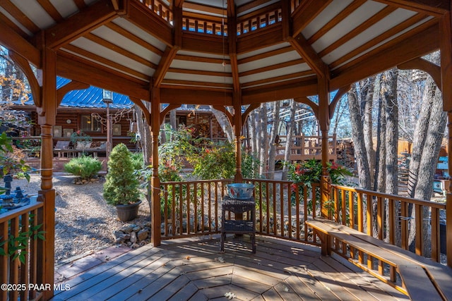 wooden deck featuring a gazebo