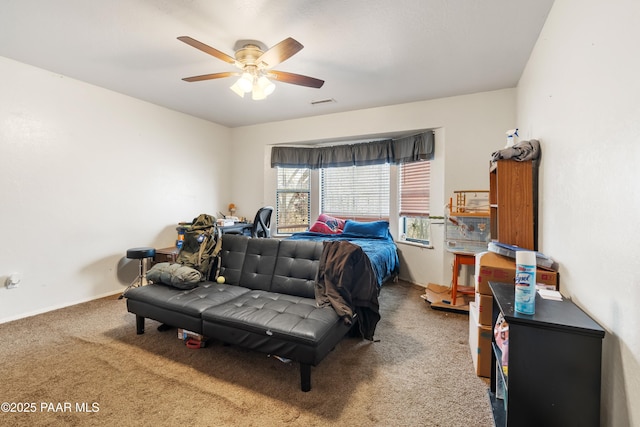 bedroom featuring carpet, visible vents, and a ceiling fan