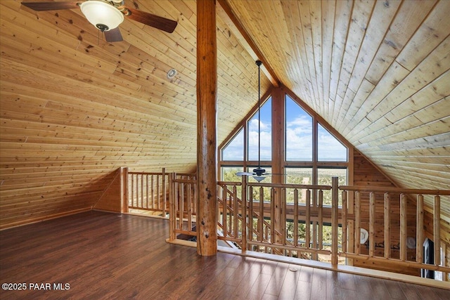 additional living space with ceiling fan, wooden ceiling, hardwood / wood-style floors, and vaulted ceiling with beams